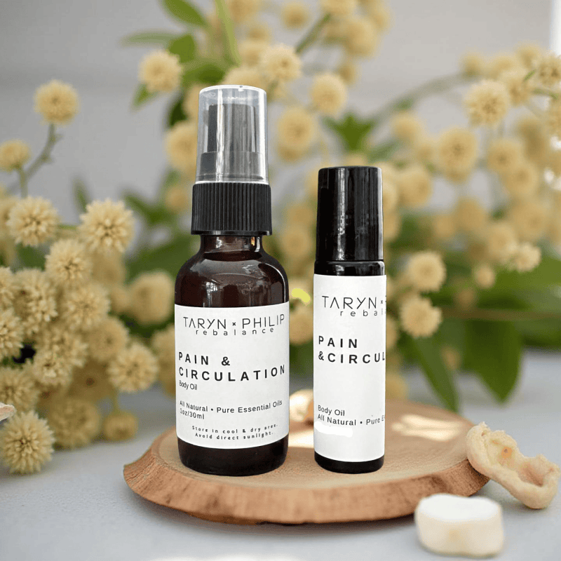 Two Taryn x Philip products on a wooden board with flowers in the background